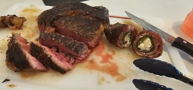 A prepared beef cut on a plate